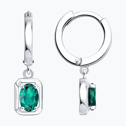 Серьги из серебра с изумрудами - видео на модели