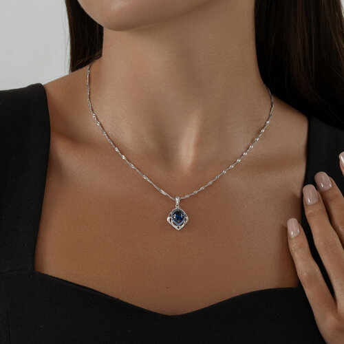 Подвеска из серебра с корундом сапфировым (синт.) и синими фианитами из серебро — вид 4