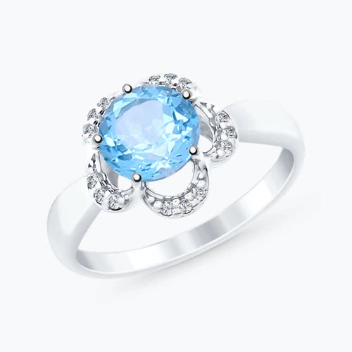 Кольцо из серебра с топазом и фианитами из серебро