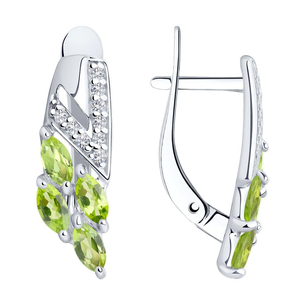 Серьги из серебра с хризолитами и фианитами - видео на модели