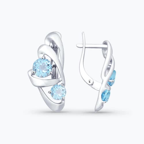 Серьги из серебра с топазами - видео на модели