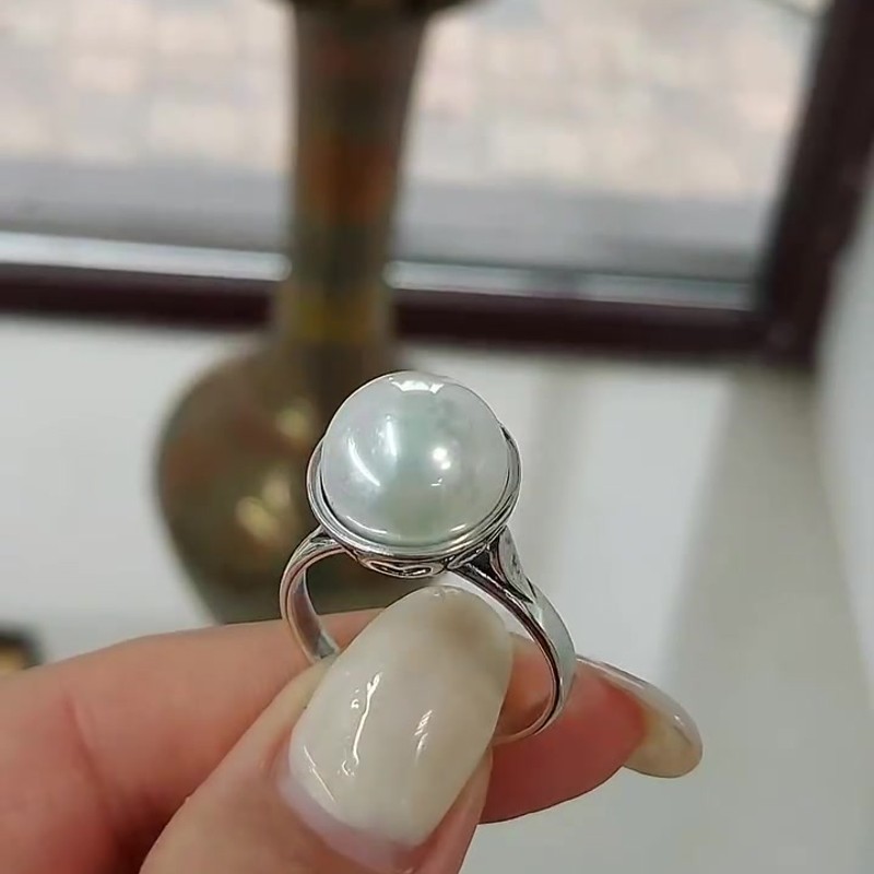 Видео: Серебряное кольцо 925 пробы с культивированным жемчугом и фианитами