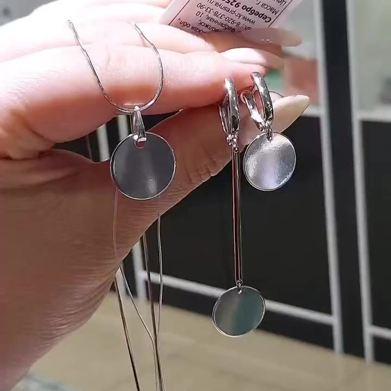 Серебряные асимметричные серьги с дисками 925 пробы