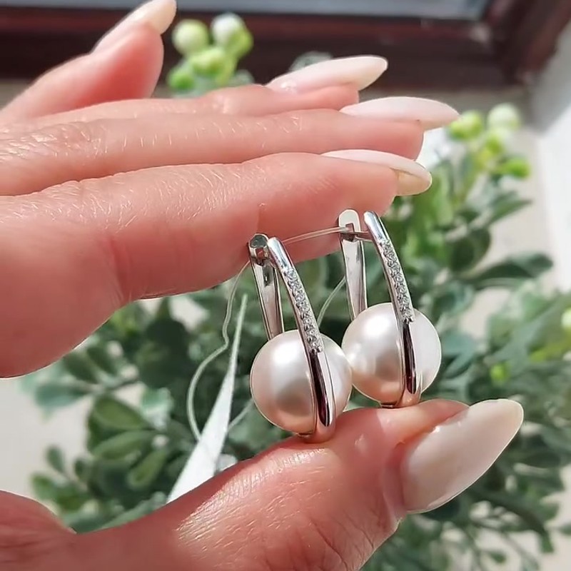 Серебряные серьги 925 пробы с имитацией жемчуга и фианитами - Instagram Reel 