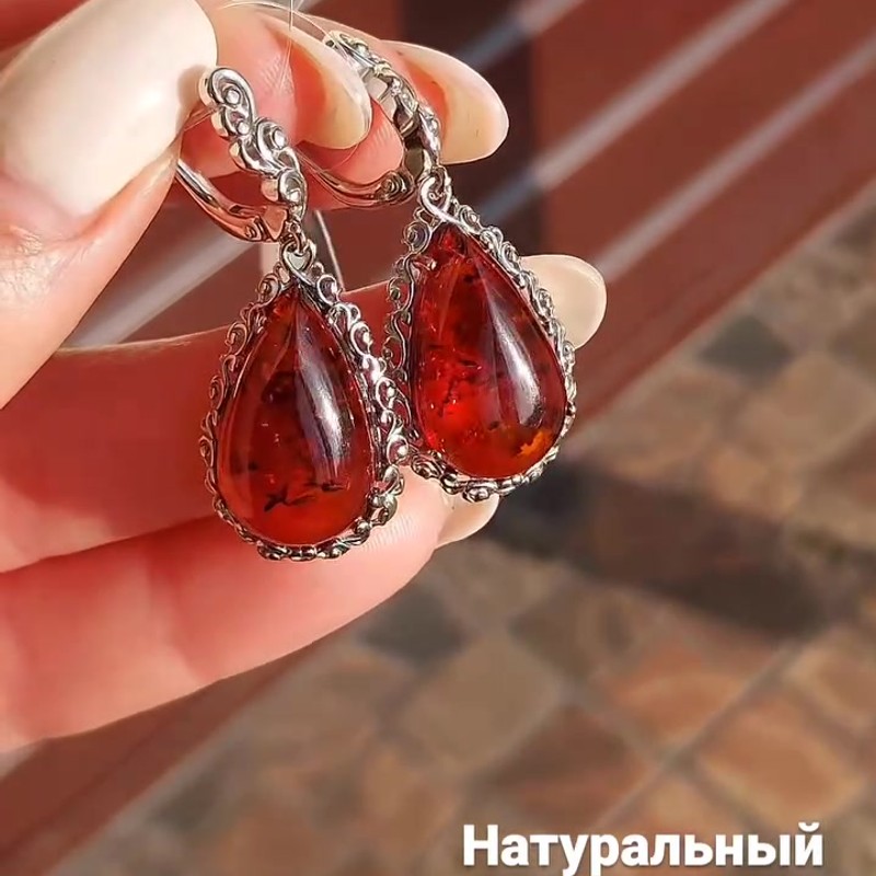 Серебряные серьги с натуральным янтарём 925 пробы в ажурной оправе