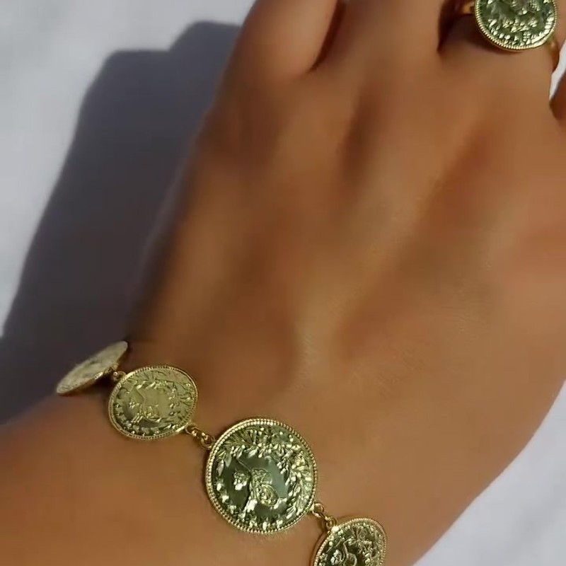 Серебряный браслет с позолотой 925 пробы в виде монет из серебро