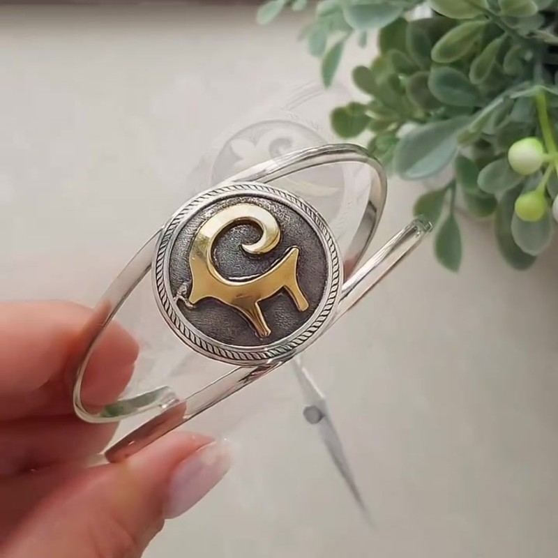 Серебряный браслет блезик 925 пробы с позолотой и национальным орнаментом