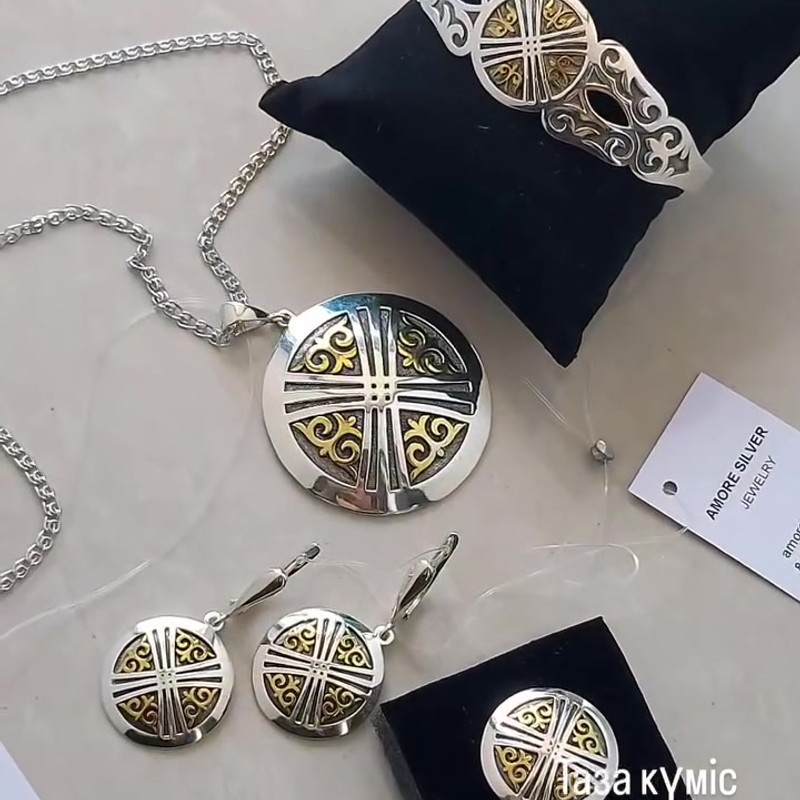 Серебряное кольцо 925 пробы с позолотой и символом Шанырак